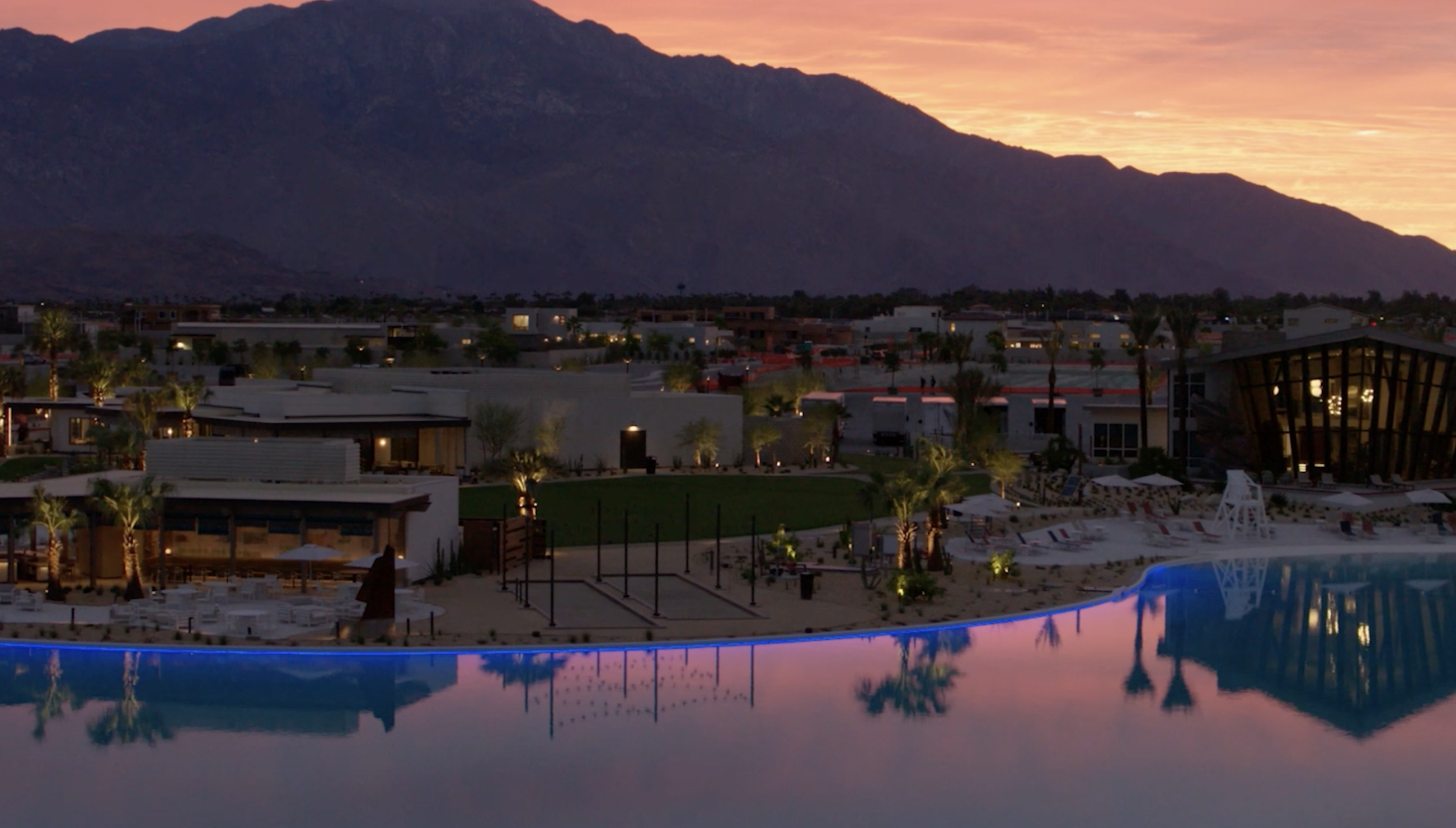 Cotino at dusk, the lagoon reflecting a pink sky.