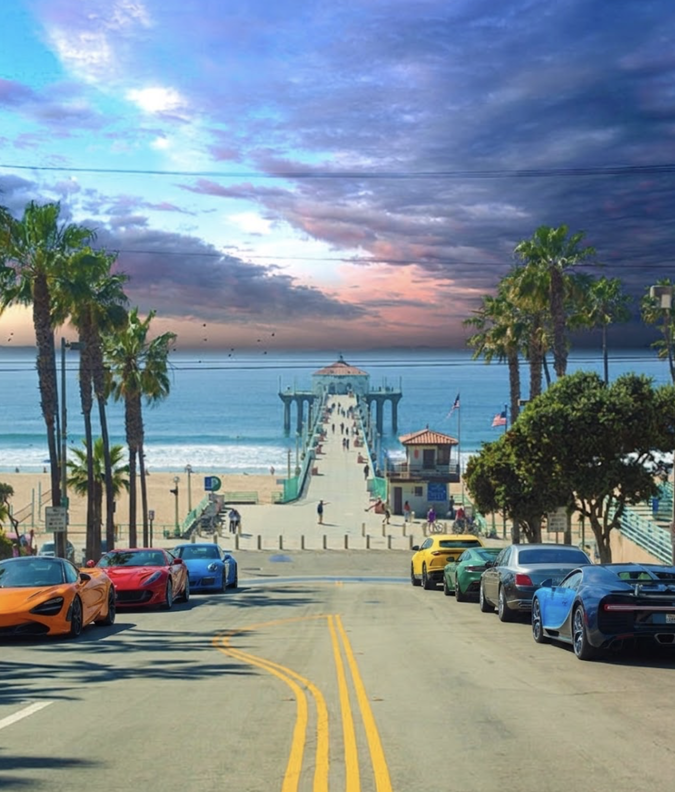Manhattan Beach — the pier at the foot of the hill, palms and parked cars along the street at dusk.